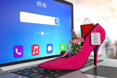 buying and flowers inside shoes. E-commerce.